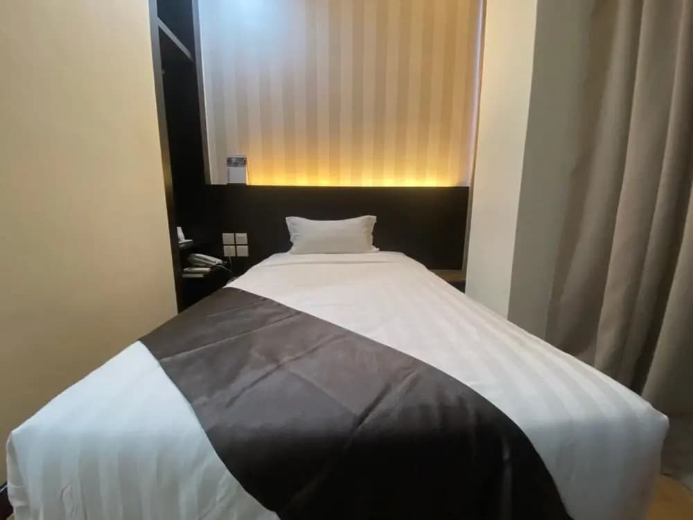 Capital O 90447 Hotel Ezzyhome Kebun Teh - photo 6