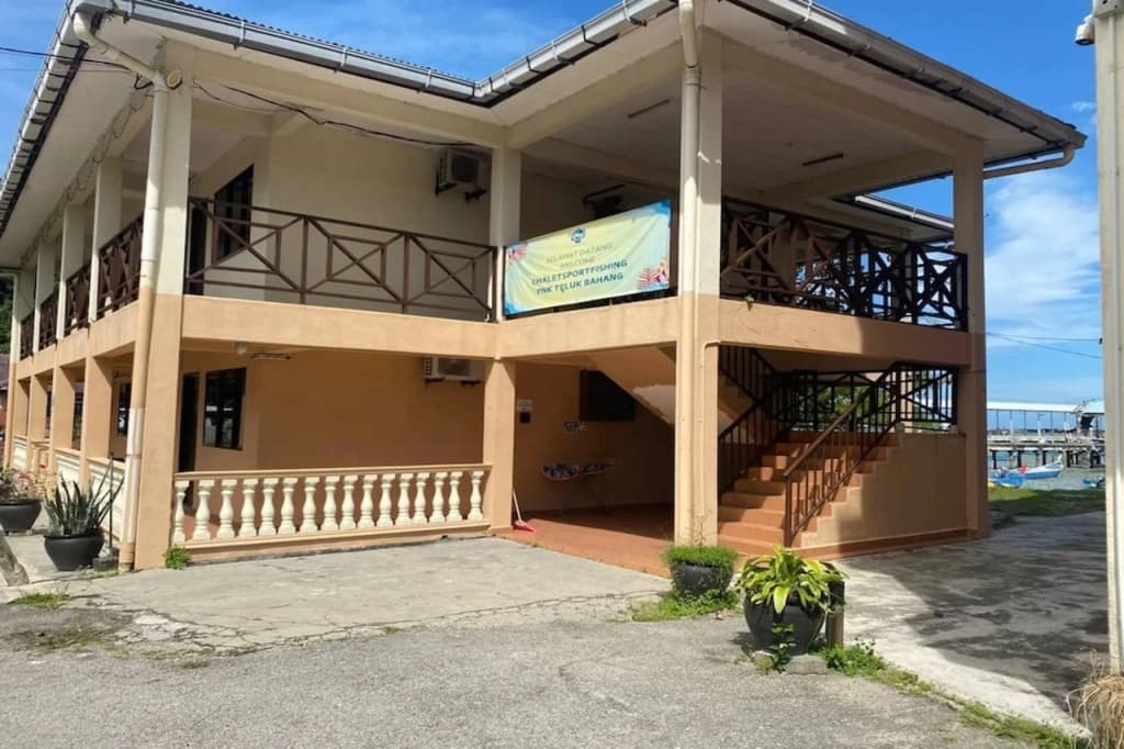 Capital O 91094 Hotel & Chalet Sportfishing - photo 1