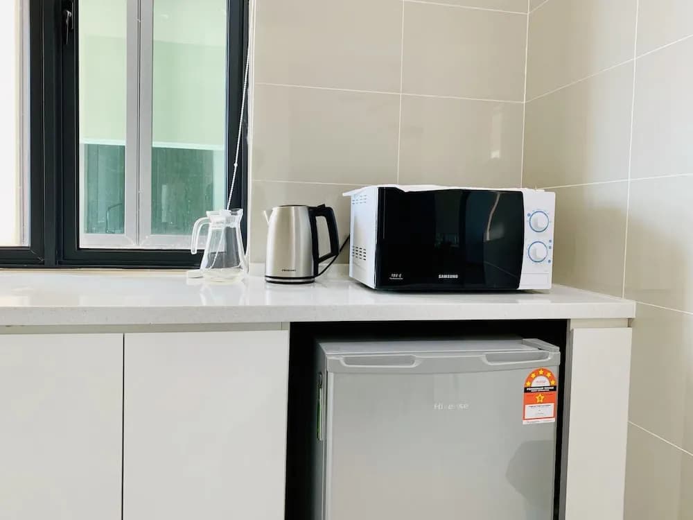 D'wharf Residence PD Waterfront Family Premier Suite by AirPlan - photo 13