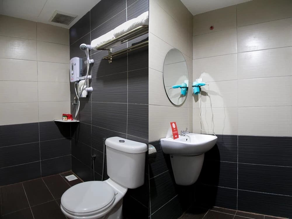 OYO 143 Swan Cottage Hotel - photo 8
