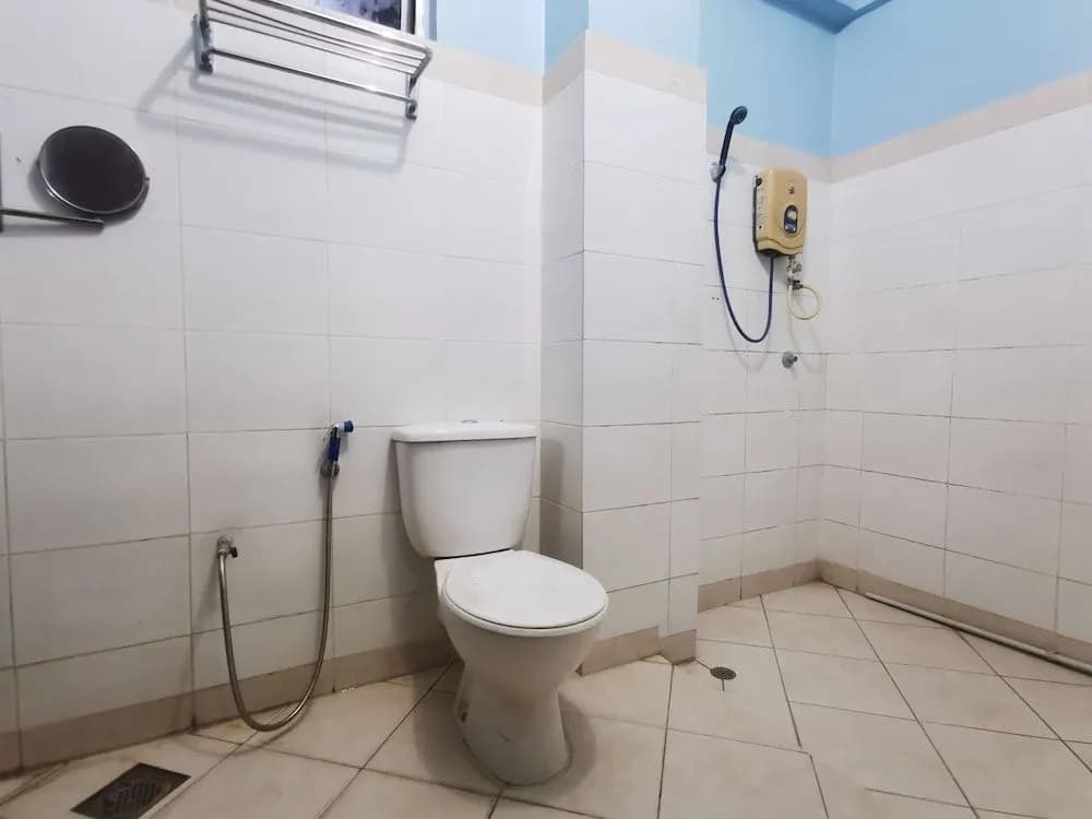 OYO 90061 Kuhara Court Apartment Suite - photo 8