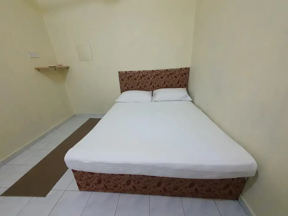 Oyo 90304 Persada Hasra Homestay - photo 4