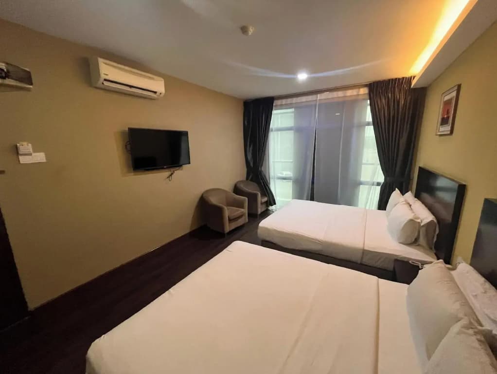 Capital O 91074 Grand World Hotel - photo 21
