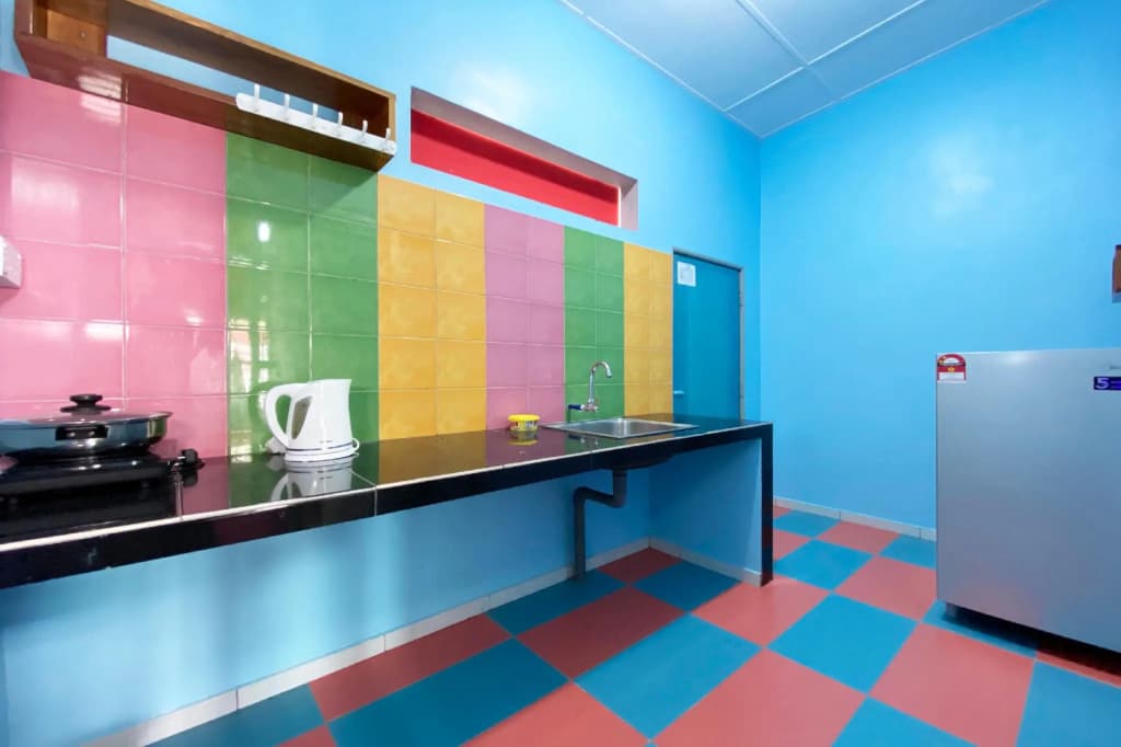 OYO HOME 90312 Rainbow Guesthouse - photo 10