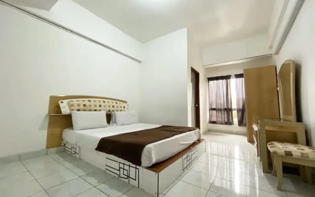 OYO 90184 Api Api Guesthouse 533 - photo 5
