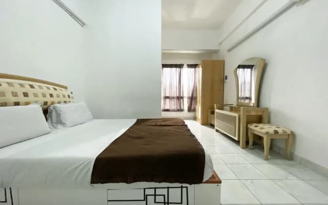 OYO 90184 Api Api Guesthouse 533 - photo 3