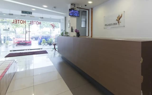 OYO 489 Pegasus Inn Hotel - photo 2