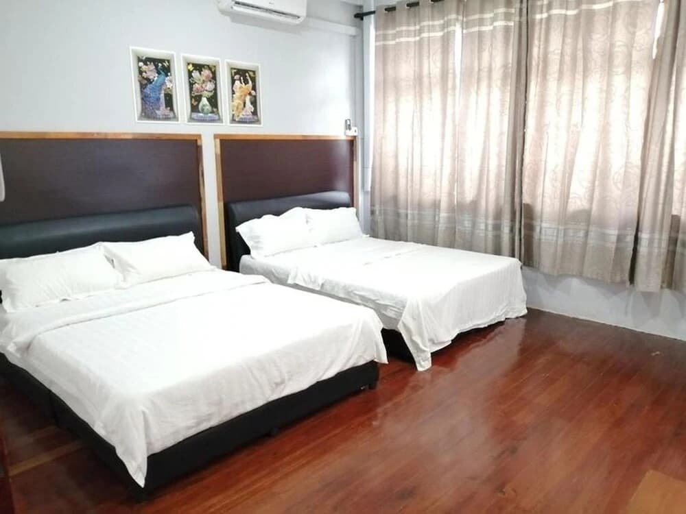 Comfortable Family Room for 4 People in Kuching With Ac - Amida Point Services - main photo