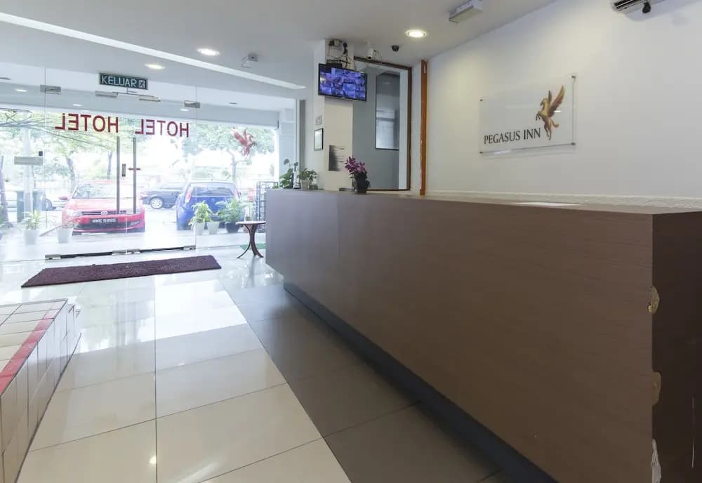 OYO 489 Pegasus Inn Hotel - photo 2